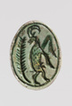 Scarab depicting a rearing ibex, Green glazed steatite